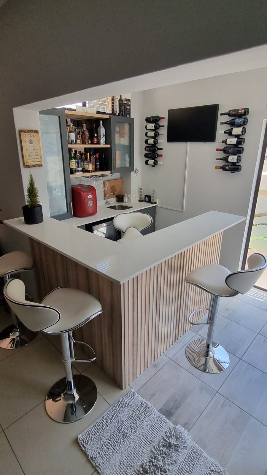 Oak slat corner home bar