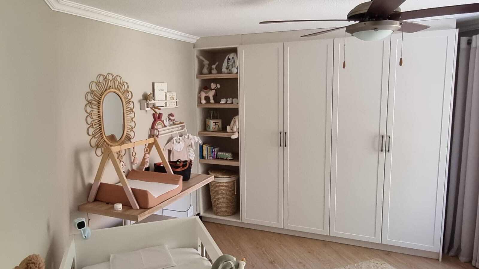 Nursery wardrobe with open toy shelving