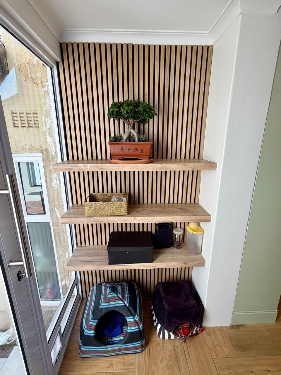 Under-stair oak slat shelving with lighting