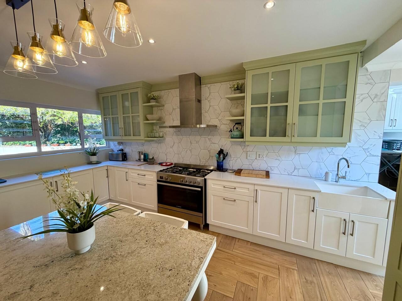 Sage green shaker kitchen